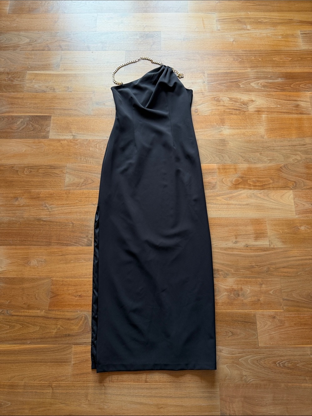 Elegant Black Dress with Chain Strap and Leg Slit